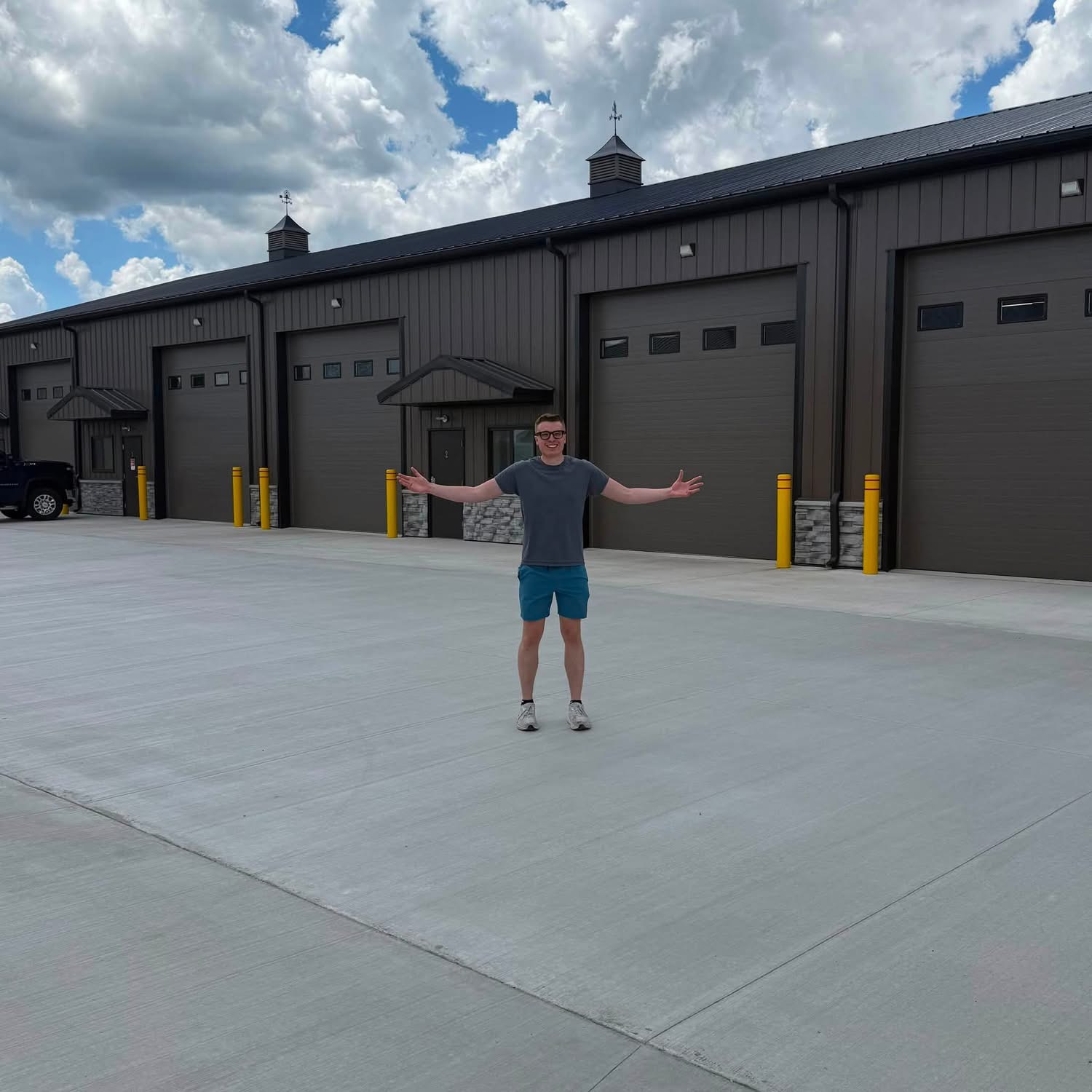Zach in front of the new Wapi Bricks warehouse