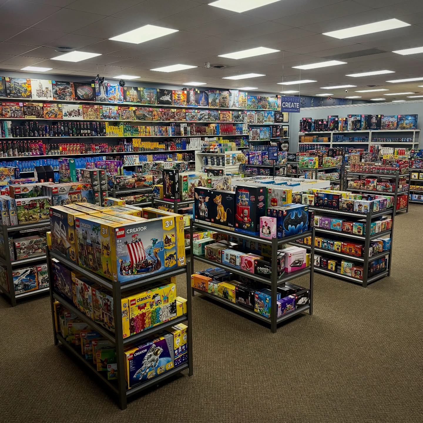 Wide view of the Wapi Bricks sales floor filled with LEGO sets
